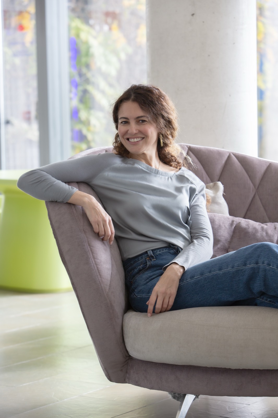 Catherine Rubio, seated in an armchair