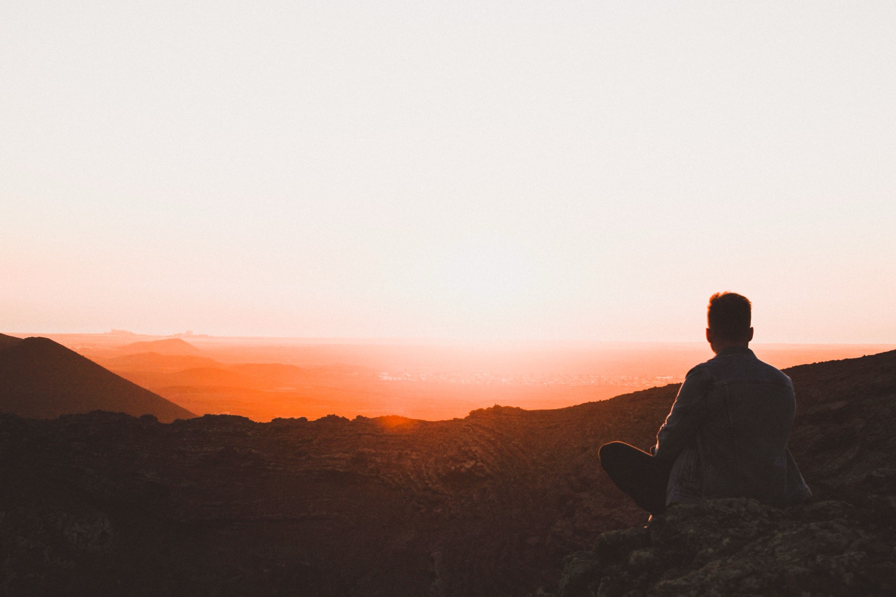 The sun setting over an open overlook